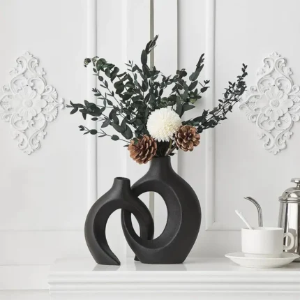 Ensemble de 2 vases en céramique modernes Lvases Snuggle Hollow, vases décoratifs esthétique nordique du milieu du siècle pour la décoration de table à la maison (noir mat)