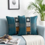 Sage Green Velvet Decorative Throw Pillow with Embroidered Geometric Band and Textured Detail.